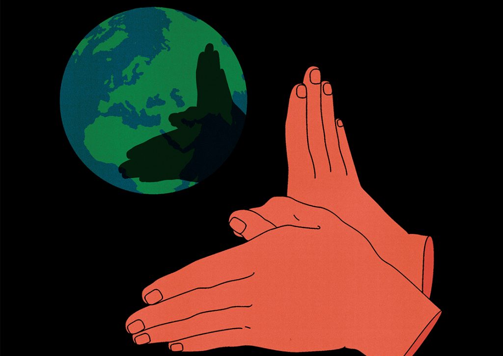 Illustration av händer som gör en skuggfjäril på jordklotet