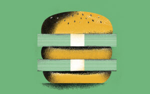 Illustration av en hamburgare med sedelbuntar istället för kött